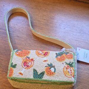 Vibrant Beaded Clutch with Orange and Green Accents